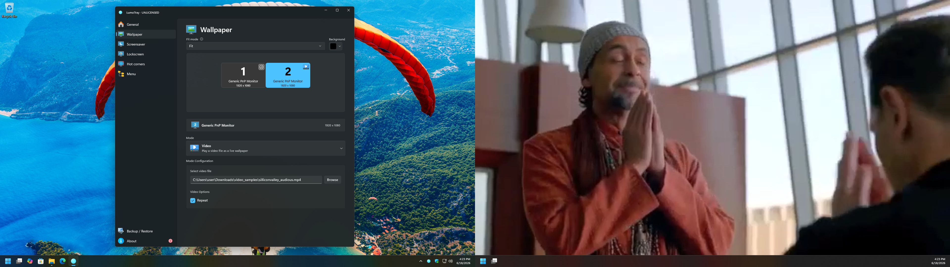 LumoTray using video wallpaper on one monitor in a dual-monitor setup.